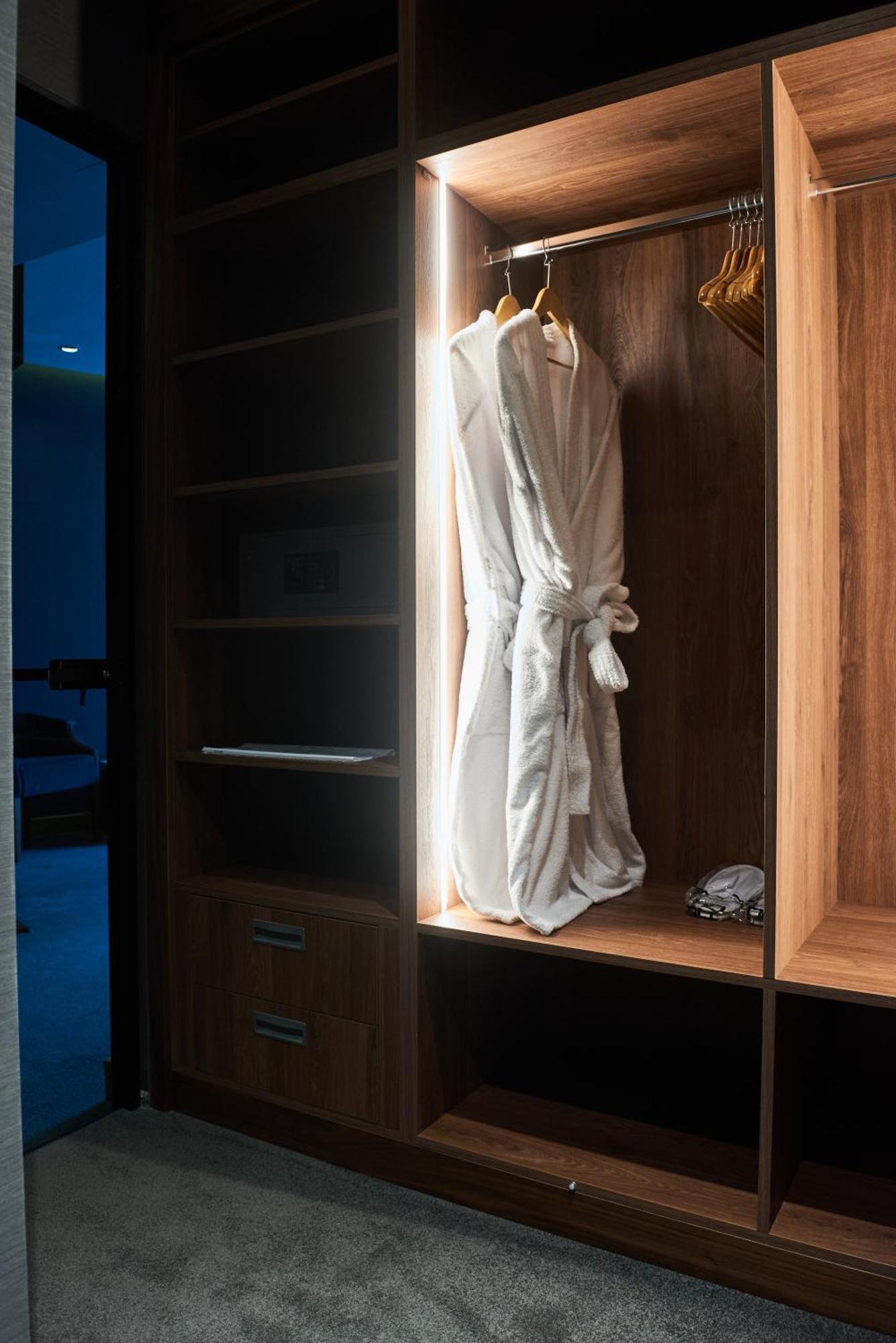 Hotel Pupin 노비사드 외부 사진 A bathrobe hanging in a closet